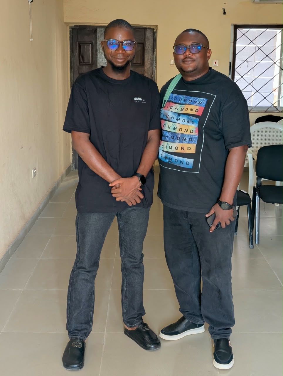 Rasheed with a colleague at the goodbye