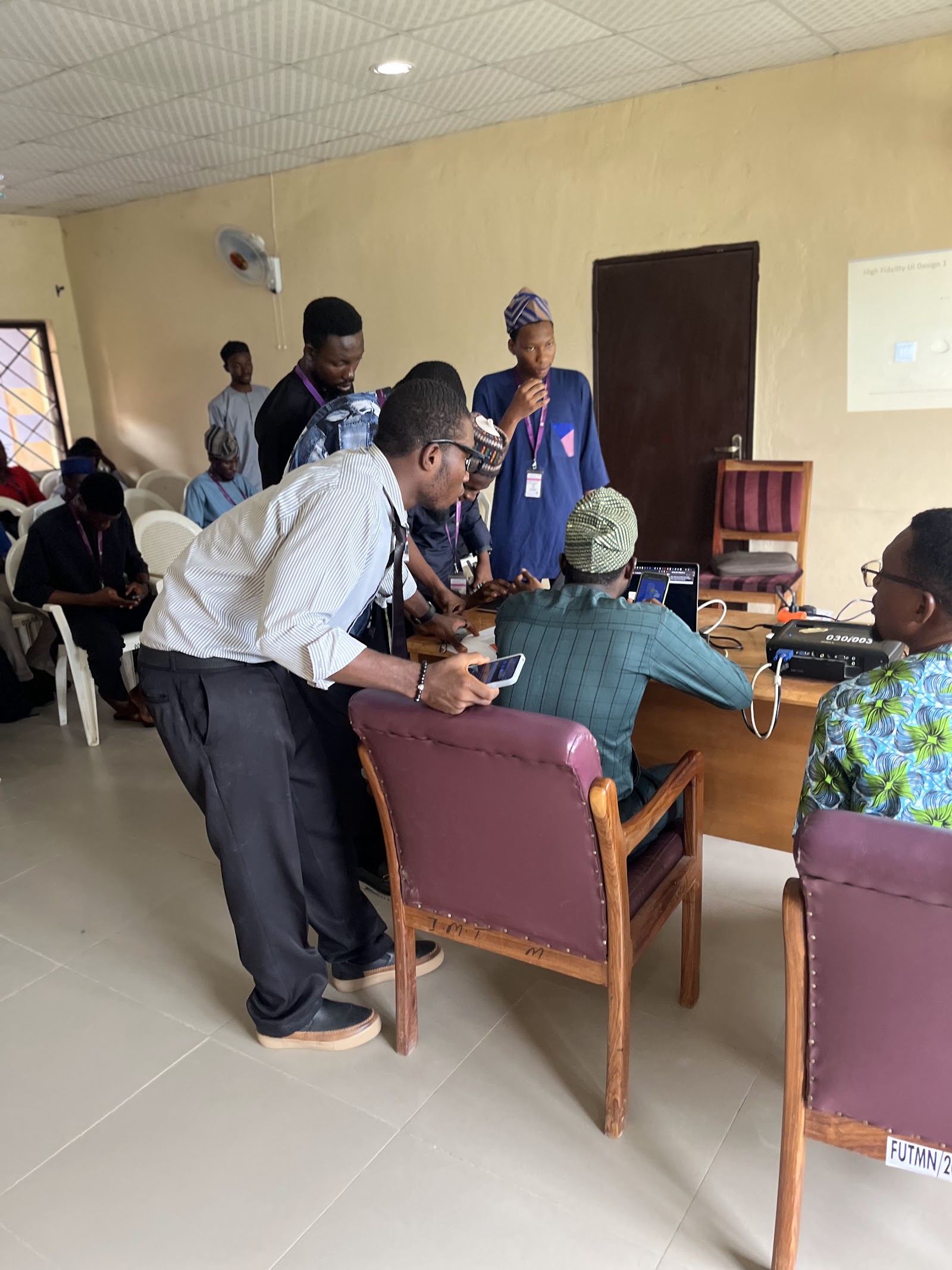 Student walking through project features with lecturer